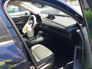 2023 Mazda CX-30 S Select with VIN 3MVDMBBM3PM514030, listed as a IAAI auction lot 42326959 with 41,226 mi miles and . Bid and sale history available at DreamBid. Image 5.