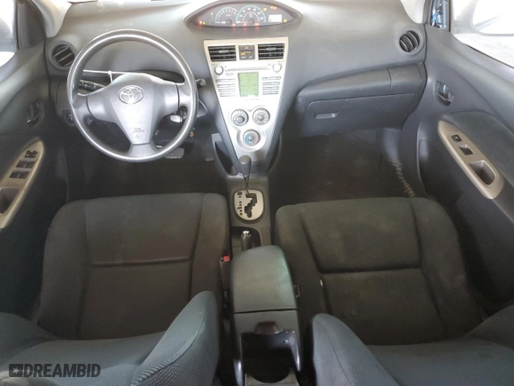 2009 Toyota Yaris with VIN JTDBT903994053624, listed as a Copart auction lot 53906565 with 227,211 mi miles and Salvage Title. Bid and sale history available at carsss.com. Image 8.