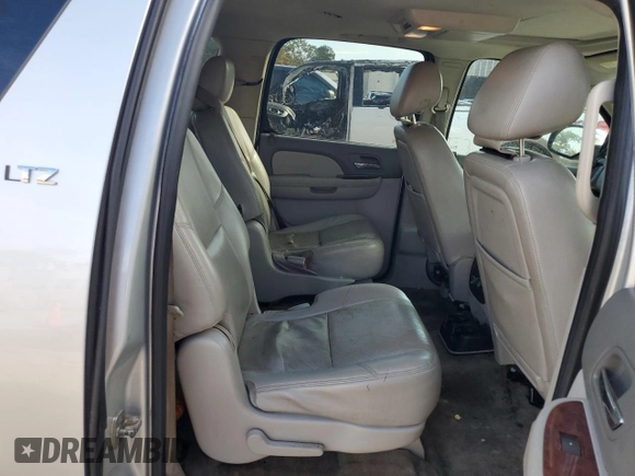 2014 Chevrolet Suburban LTZ with VIN 1GNSCKE02ER141764, listed as a Copart auction lot 85005524 with 234,019 mi miles and Salvage title. Bid and sale history available at DreamBid. Image 11.