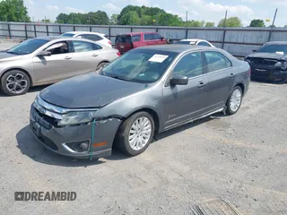 2010 Ford Fusion Hybrid with VIN 3FADP0L37AR270739, listed as a IAAI auction lot 42143035 with 238,111 mi miles. Bid and sale history available at carsss.com. Image 2.