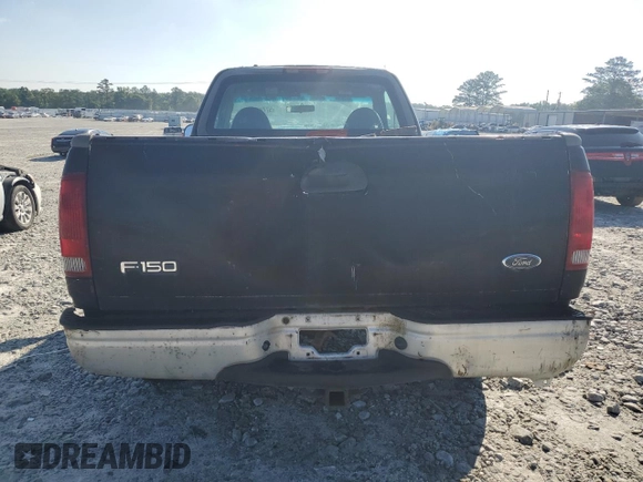 2000 Ford F-150 XL with VIN 1FTRF18W9YNB95521, listed as a Copart auction lot 57720434 with 203,143 mi miles and Clean title. Bid and sale history available at DreamBid. Image 6.
