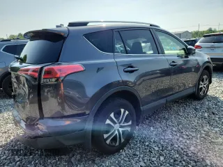 2017 Toyota RAV4 LE with VIN JTMBFREV5HJ146464, listed as a Copart auction lot 61841125 with 125,365 mi miles and Salvage title. Bid and sale history available at DreamBid. Image 3.