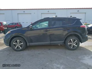 2016 Toyota RAV4 XLE with VIN 2T3WFREV7GW255784, listed as a IAAI auction lot 41266085 with 87,426 mi miles. Bid and sale history available at carsss.com. Image 14.