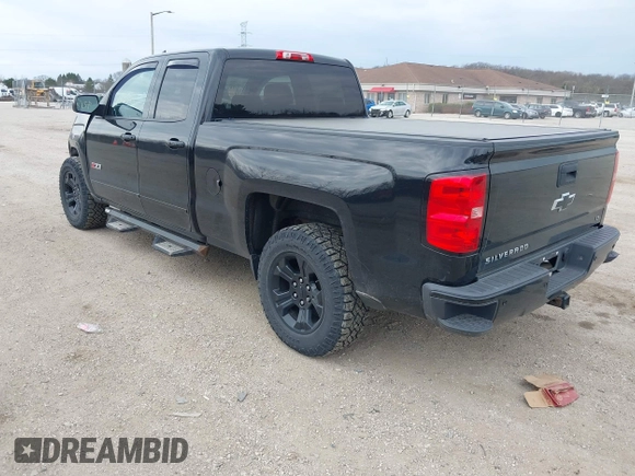 2015 Chevrolet Silverado 1500 LT with VIN 1GCVKREC2FZ427076, listed as a IAAI auction lot 42128553 with 109,776 mi miles and . Bid and sale history available at DreamBid. Image 3.