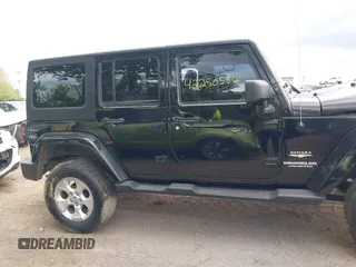 2013 Jeep Wrangler Unlimited Sahara with VIN 1C4BJWEG2DL549864, listed as a IAAI auction lot 42250556 with 231,018 mi miles and . Bid and sale history available at DreamBid. Image 14.