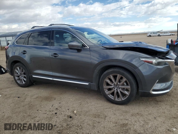 2021 Mazda CX-9 Grand Touring with VIN JM3TCBDY7M0536781, listed as a Copart auction lot 55862725 with 62,131 mi miles and Salvage title. Bid and sale history available at DreamBid. Image 4.