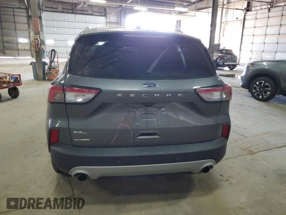 2021 Ford Escape SEL z VIN 1FMCU0H66MUB04206, wystawiony jako Copart lot #56638585 z przebiegiem Nie podano mil oraz Szkoda całkowita • Salvage title. Historia ofert i sprzedaży dostępna na DreamBid. Obrazek 6.
