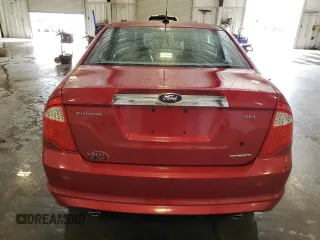 2012 Ford Fusion SEL z VIN 3FAHP0JG0CR265666, wystawiony jako Copart lot #62860355 z przebiegiem 126 812 mil mil oraz Szkoda całkowita • Salvage title. Historia ofert i sprzedaży dostępna na DreamBid. Obrazek 6.