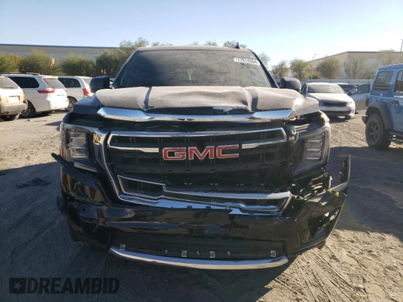 2022 GMC Yukon SLT with VIN 1GKS2BKD5NR356479, listed as a Copart auction lot 77674304 with 33,580 mi miles and Salvage Title. Bid and sale history available at carsss.com. Image 5.