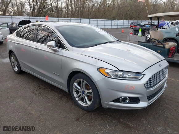 2015 Ford Fusion Titanium Hybrid with VIN 3FA6P0RU8FR181312, listed as a IAAI auction lot 42071584 with 99,955 mi miles. Bid and sale history available at carsss.com. Image 1.