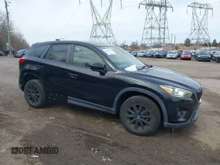 2015 Mazda CX-5 Touring with VIN JM3KE4CY2F0445178, listed as a IAAI auction lot 41828953 with 137,330 mi miles and . Bid and sale history available at DreamBid. Image 1.