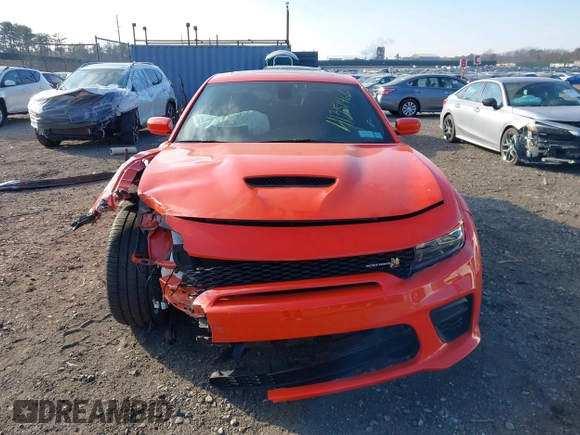 2022 Dodge Charger Scat Pack Widebody with VIN 2C3CDXGJ3NH101081, listed as a IAAI auction lot 41351466 with 9,575 mi miles and . Bid and sale history available at DreamBid. Image 12.