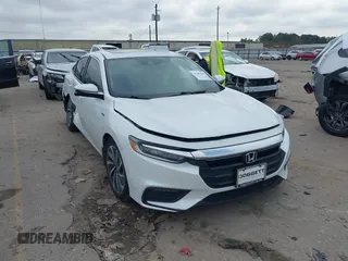 2020 Honda Insight Touring with VIN 19XZE4F90LE009301, listed as a IAAI auction lot 41661665 with 73,673 mi miles and . Bid and sale history available at carsss.com. Image 1.