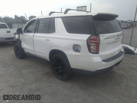 2022 Chevrolet Tahoe LT with VIN 1GNSKNKD5NR143276, listed as a IAAI auction lot 42268541 with 54,463 mi miles and . Bid and sale history available at DreamBid. Image 3.