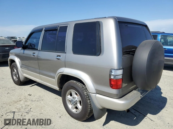 2001 Isuzu Trooper S with VIN JACDS58X817J03149, listed as a Copart auction lot 63456605 with 125,559 mi miles and Clean title. Bid and sale history available at DreamBid. Image 2.