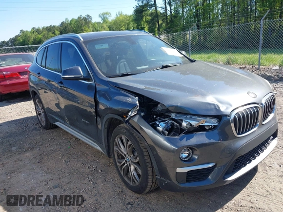 2017 BMW X1 xDrive28i with VIN WBXHT3C31H5F80056, listed as a IAAI auction lot 42049925 with 64,471 mi miles and . Bid and sale history available at DreamBid. Image 1.