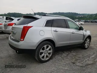 2015 Cadillac SRX Performance Collection with VIN 3GYFNFE36FS549358, listed as a Copart auction lot 59724065 with 132,045 mi miles and Salvage title. Bid and sale history available at DreamBid. Image 3.