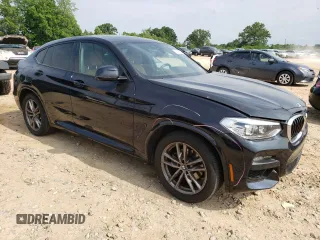 2021 BMW X4 xDrive30i with VIN 5UX2V1C04M9E92675, listed as a Copart auction lot 52495333 with 54,111 mi miles. Bid and sale history available at carsss.com. Image 4.