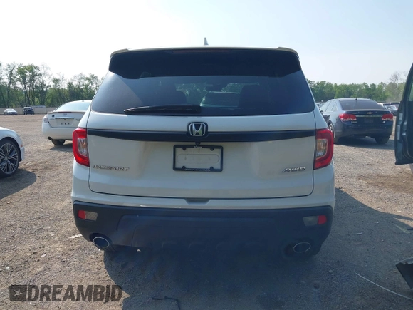 2019 Honda Passport EX-L with VIN 5FNYF8H56KB029748, listed as a IAAI auction lot 42405028 with 59,009 mi miles and . Bid and sale history available at DreamBid. Image 17.