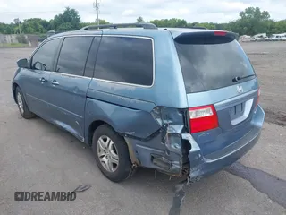 2005 Honda Odyssey EX with VIN 5FNRL38435B101887, listed as a IAAI auction lot 42704893 with 185,137 mi miles and . Bid and sale history available at DreamBid. Image 3.