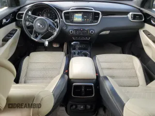 2016 Kia Sorento SX z VIN 5XYPKDA51GG099149, wystawiony jako Copart lot #86369074 z przebiegiem 173 923 mil mil oraz Szkoda całkowita • Salvage title. Historia ofert i sprzedaży dostępna na DreamBid. Obrazek 8.