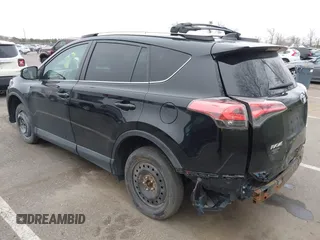 2016 Toyota RAV4 LE with VIN 2T3BFREV3GW447802, listed as a IAAI auction lot 41985438 with 213,247 mi miles. Bid and sale history available at carsss.com. Image 3.