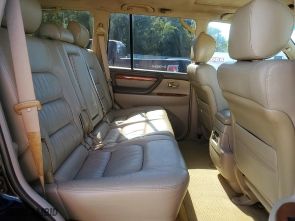 2006 Lexus LX 470 with VIN JTJHT00W664006446, listed as a Copart auction lot 73165774 with 294,950 mi miles and Salvage Title. Bid and sale history available at carsss.com. Image 11.