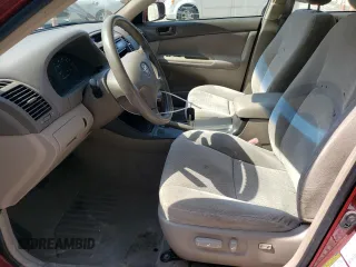 2004 Toyota Camry LE z VIN 4T1BE32K94U284667, wystawiony jako Copart lot #56184025 z przebiegiem 198 929 mil mil oraz Szkoda całkowita • Salvage title. Historia ofert i sprzedaży dostępna na DreamBid. Obrazek 7.