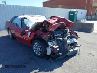2011 Cadillac DTS Premium Collection z VIN 1G6KH5E67BU127158, wystawiony jako IAAI lot #41704336 z przebiegiem Nie podano mil oraz . Historia ofert i sprzedaży dostępna na DreamBid. Obrazek 1.