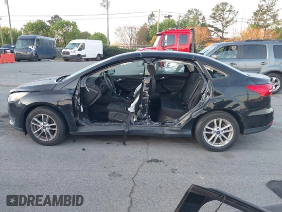 2017 Ford Focus SE with VIN 1FADP3FE7HL298287, listed as a IAAI auction lot 41870698 with Not Provided miles and . Bid and sale history available at carsss.com. Image 13.