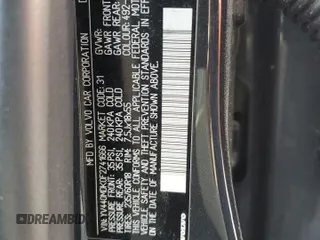 2015 Volvo XC60 T5 Drive-E Premier z VIN YV440MDK0F2741666, wystawiony jako Copart lot #53102915 z przebiegiem Nie podano mil oraz Szkoda całkowita • Salvage title. Historia ofert i sprzedaży dostępna na DreamBid. Obrazek 14.