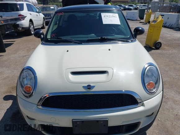 2011 MINI Hardtop S with VIN WMWSV3C50BTY23450, listed as a IAAI auction lot 42121502 with 239,025 mi miles and . Bid and sale history available at DreamBid. Image 6.