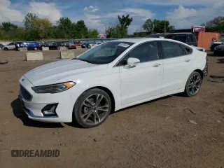 2020 Ford Fusion Titanium with VIN 3FA6P0D96LR173756, listed as a Copart auction lot 56467885 with 77,217 mi miles and Salvage title. Bid and sale history available at DreamBid. Image 1.