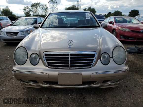 2002 Mercedes-Benz E-Class with VIN WDBJF82JX2X070380, listed as a Copart auction lot 68675974 with 88,274 mi miles and Salvage Title. Bid and sale history available at carsss.com. Image 5.