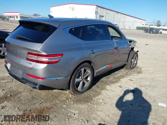 2023 Genesis GV80 with VIN KMUHCESC6PU128600, listed as a IAAI auction lot 41179553 with 33,225 mi miles and . Bid and sale history available at DreamBid. Image 4.