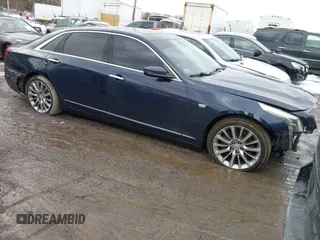 2017 Cadillac CT6 Luxury AWD z VIN 1G6KD5RS4HU165765, wystawiony jako IAAI lot #41526164 z przebiegiem 114 974 mil mil oraz . Historia ofert i sprzedaży dostępna na DreamBid. Obrazek 1.