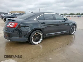 2014 Ford Taurus SHO z VIN 1FAHP2KT4EG106957, wystawiony jako Copart lot #59364185 z przebiegiem 113 704 mil mil oraz Szkoda całkowita • Salvage title. Historia ofert i sprzedaży dostępna na DreamBid. Obrazek 3.