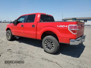 2014 Ford F-150 XL with VIN 1FTFW1EFXEKF37949, listed as a Copart auction lot 61257084 with 154,154 mi miles and Salvage Title. Bid and sale history available at carsss.com. Image 2.