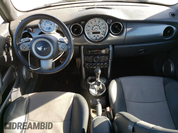 2007 MINI Convertible S with VIN WMWRH33547TL93855, listed as a Copart auction lot 78313133 with 130,832 mi miles and Salvage title. Bid and sale history available at DreamBid. Image 8.