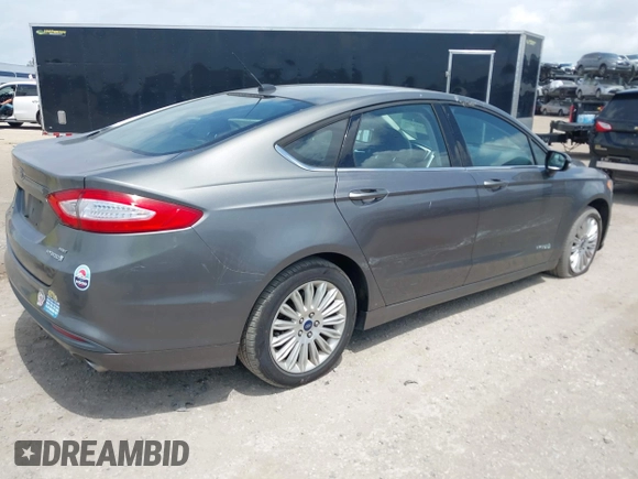 2013 Ford Fusion SE Hybrid with VIN 3FA6P0LU3DR338282, listed as a IAAI auction lot 41973498 with 187,375 mi miles. Bid and sale history available at carsss.com. Image 4.