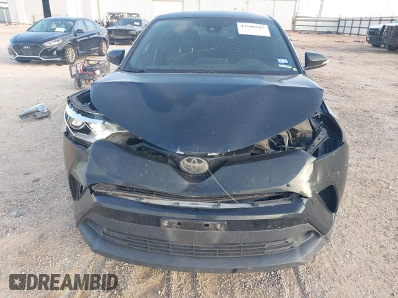 2018 Toyota C-HR XLE with VIN JTNKHMBX6J1007058, listed as a IAAI auction lot 42100587 with 71,725 mi miles and . Bid and sale history available at DreamBid. Image 6.