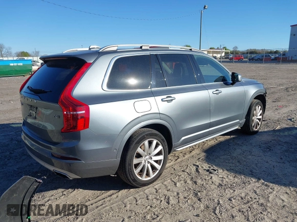 2017 Volvo XC90 Momentum with VIN YV4A22PK7H1172370, listed as a IAAI auction lot 41835935 with 103,577 mi miles. Bid and sale history available at carsss.com. Image 4.