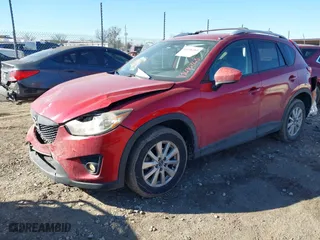 2014 Mazda CX-5 Touring with VIN JM3KE2CYXE0337149, listed as a IAAI auction lot 41696363 with 128,165 mi miles. Bid and sale history available at carsss.com. Image 20.