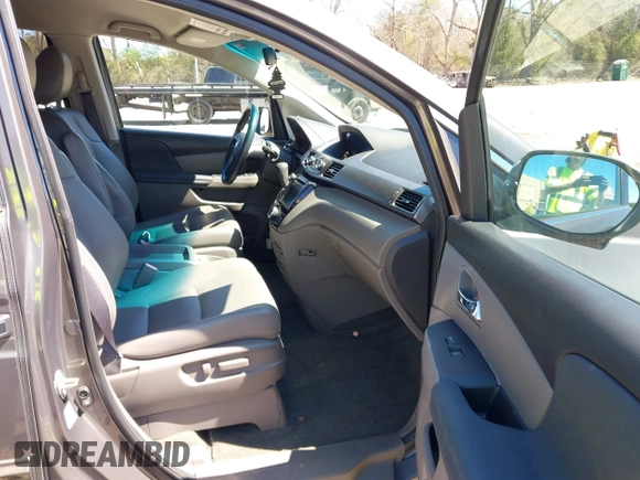 2017 Honda Odyssey SE with VIN 5FNRL5H37HB010208, listed as a IAAI auction lot 41828809 with 67,399 mi miles and . Bid and sale history available at carsss.com. Image 5.