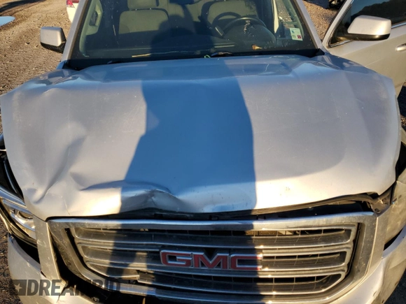 2015 GMC Yukon XL SLE z VIN 1GKS1GKC7FR285469, wystawiony jako Copart lot #81177424 z przebiegiem Nie podano mil oraz Czysty tytuł • Clean title. Historia ofert i sprzedaży dostępna na DreamBid. Obrazek 12.