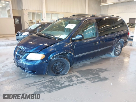 2003 Dodge Grand Caravan with VIN 2D4GP24353R195035, listed as a IAAI auction lot 41574068 with 209,165 mi miles and . Bid and sale history available at DreamBid. Image 2.