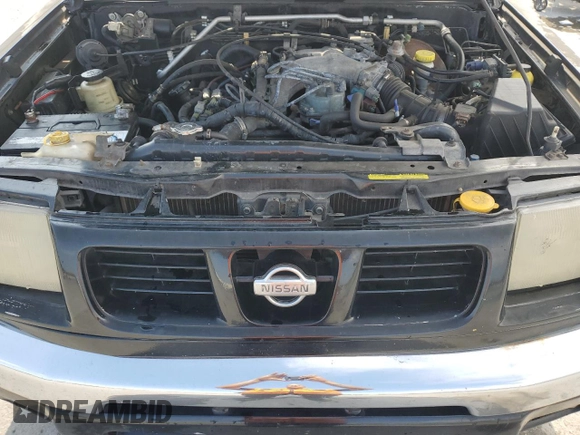 2000 Nissan Frontier XE with VIN 1N6ED27T7YC300373, listed as a Copart auction lot 55829535 with 301,305 mi miles and Salvage title. Bid and sale history available at DreamBid. Image 11.