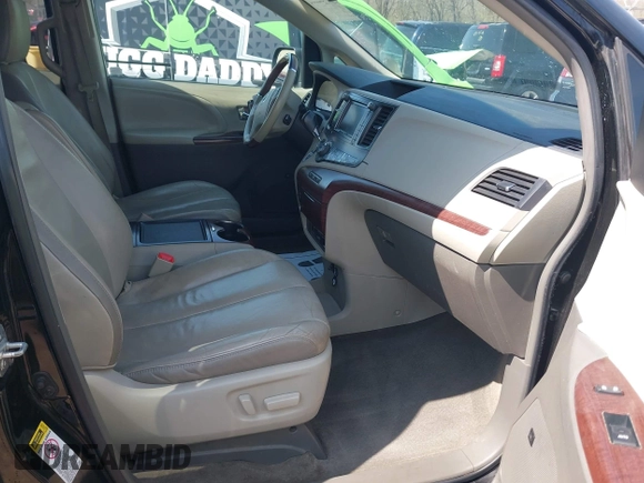 2013 Toyota Sienna XLE AAS with VIN 5TDYK3DC6DS387708, listed as a IAAI auction lot 41902860 with 191,766 mi miles and . Bid and sale history available at carsss.com. Image 5.