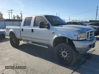 2003 Ford F-250 XL with VIN 1FTNW21S63EC36496, listed as a Copart auction lot 88551695 with 256,668 mi miles and Salvage title. Bid and sale history available at DreamBid. Image 4.