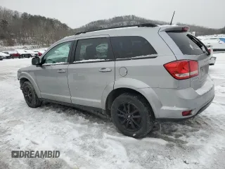 2019 Dodge Journey SE with VIN 3C4PDCBG2KT701174, listed as a Copart auction lot 46288055 with 99,879 mi miles and Salvage Title. Bid and sale history available at DreamBid. Image 2.